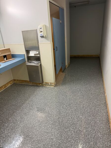Gray flake commercial restroom hallway floor coating